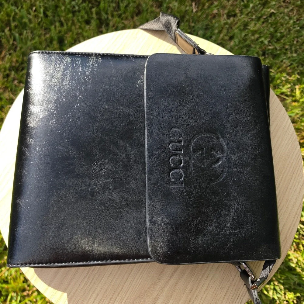 Gucci Black Embossed Logo Messenger Bag Crossbody Faux Leather Adjustable Strap